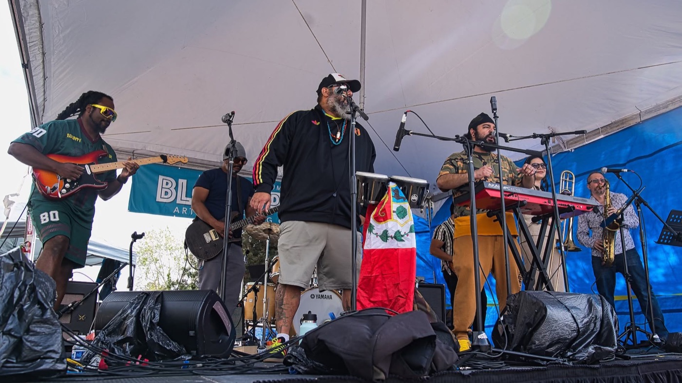 Sensory TRiBE's full band performing outdoors